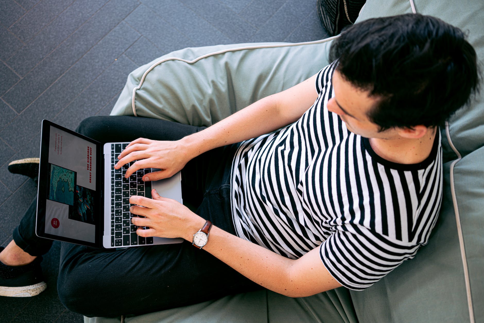 photo of man using laptop